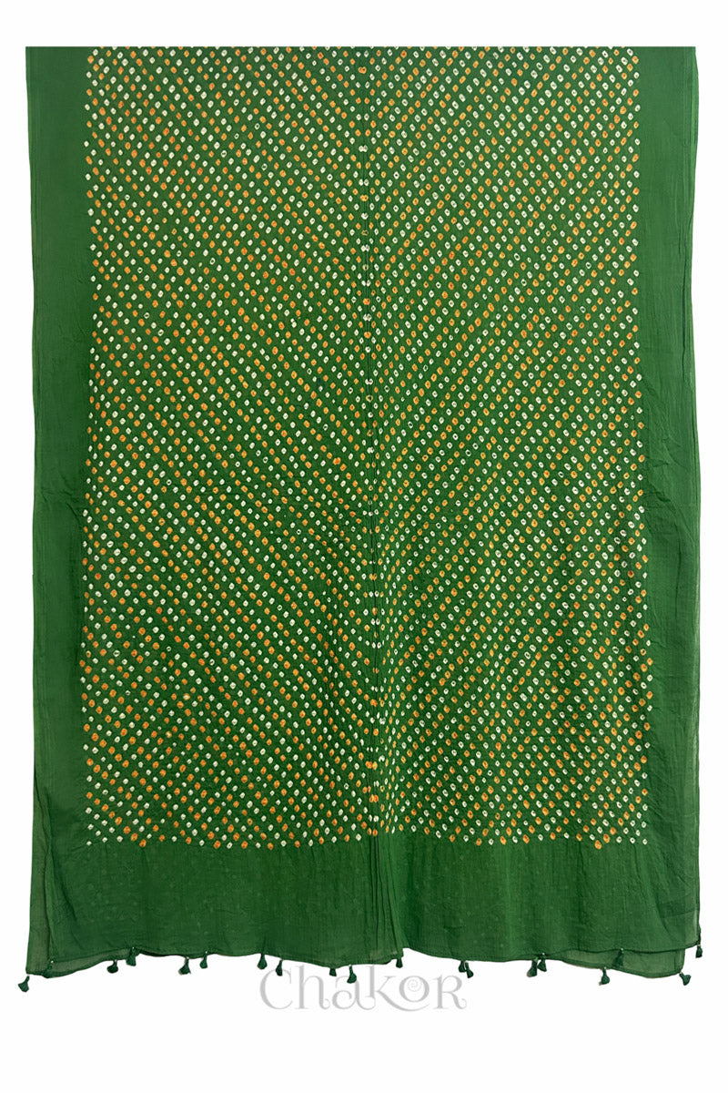 Full length view of intricate white and orange Bandhani dot pattern on Mehendi Green Mulmul cotton fabric by CHAKOR.