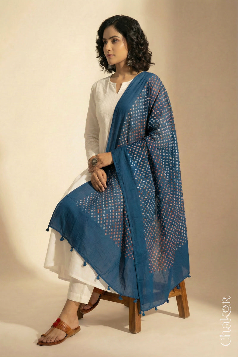 Indigo Blue Mercerised Cotton Mulmul Bandhani Dupatta, detailed with tassels draped on model - Real Bandhej by CHAKOR.
