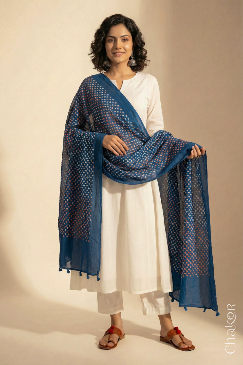 Indigo Blue Mercerised Cotton Mulmul Bandhani Dupatta, detailed with tassels draped on model - Real Bandhej by CHAKOR.