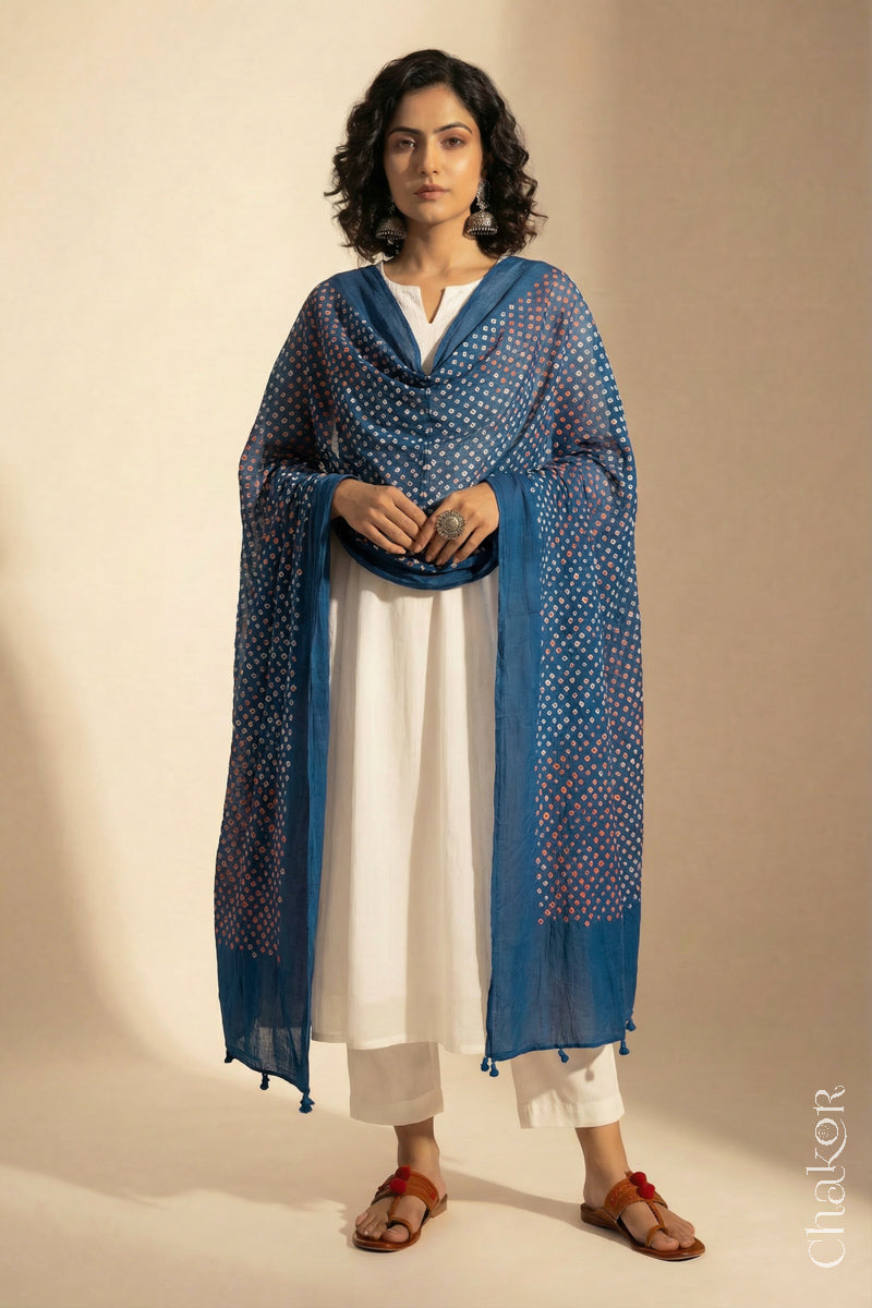 Indigo Blue Mercerised Cotton Mulmul Bandhani Dupatta, detailed with tassels draped on model - Real Bandhej by CHAKOR.