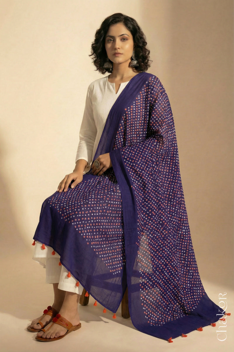 Purple Mercerised Cotton Mulmul Bandhani Dupatta, detailed with tassels draped on model - Real Bandhej by CHAKOR.