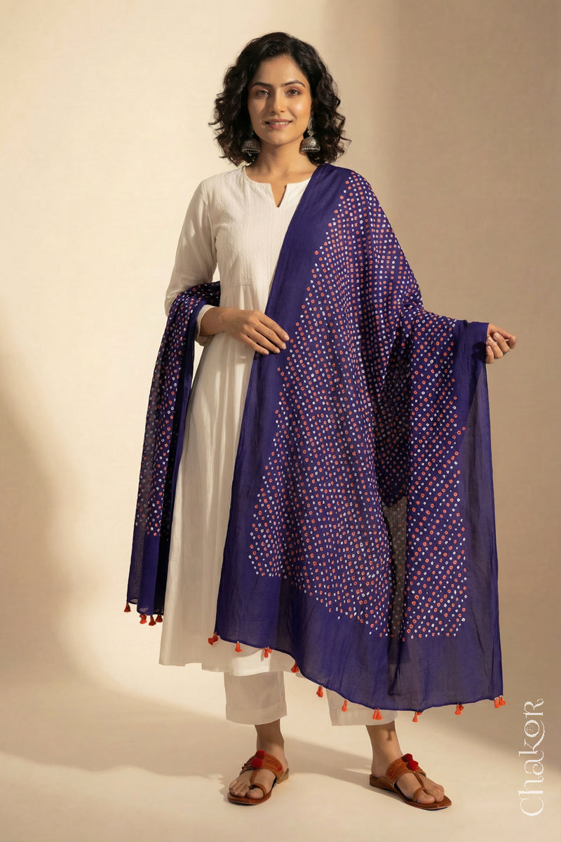 Purple Mercerised Cotton Mulmul Bandhani Dupatta, detailed with tassels draped on model - Real Bandhej by CHAKOR.