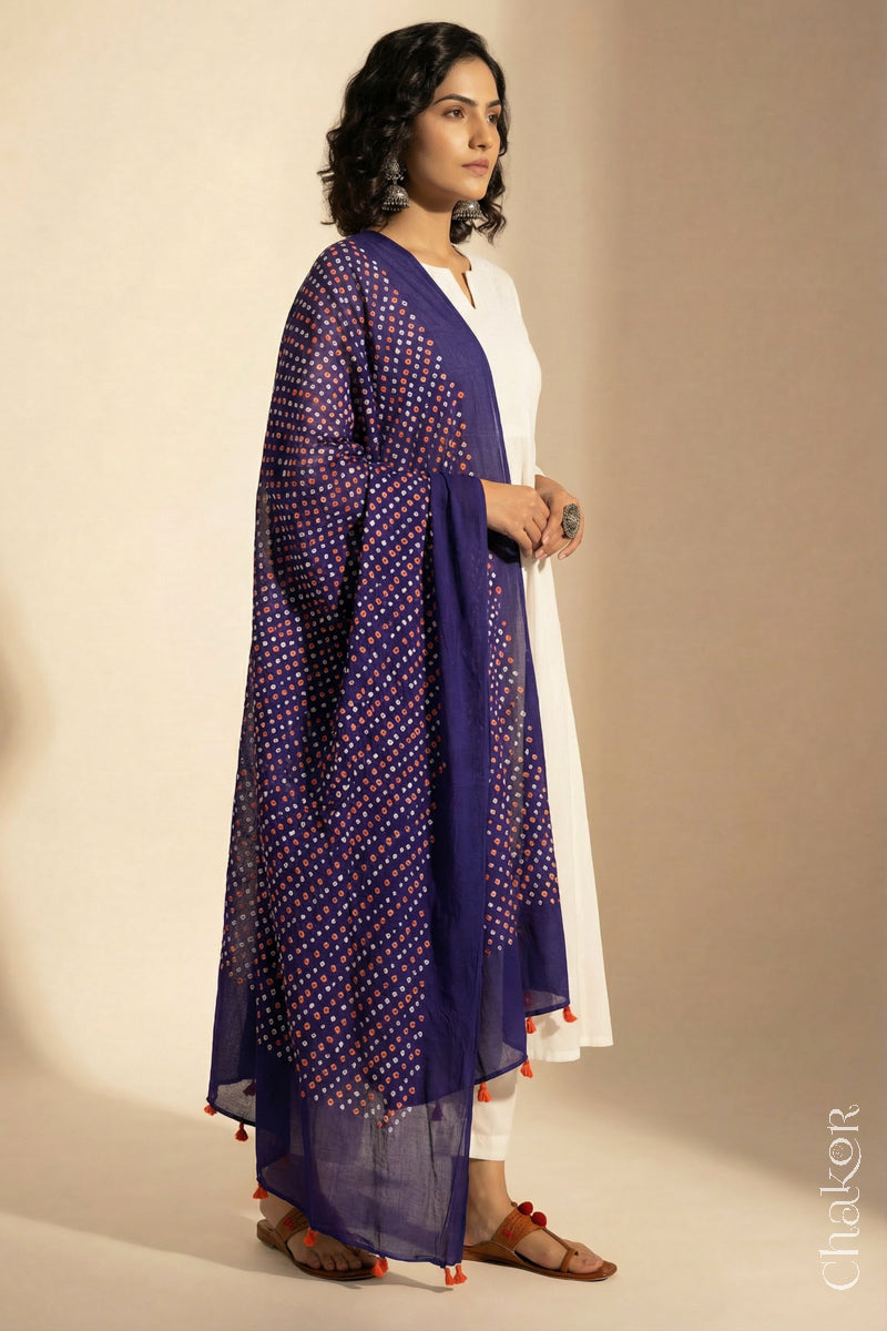Purple Mercerised Cotton Mulmul Bandhani Dupatta, detailed with tassels draped on model - Real Bandhej by CHAKOR.