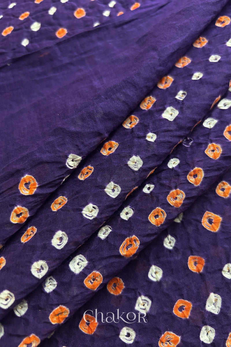 Close up of Handcrafted Purple Bandhani dupatta featuring dense white and orange tie-dye dot pattern by CHAKOR.