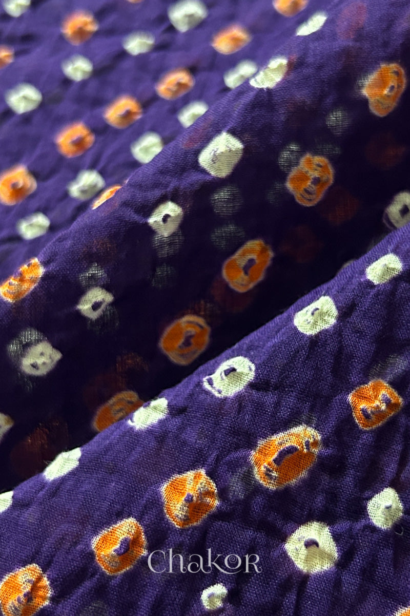 Close up of Handcrafted Purple Bandhani dupatta featuring dense white and orange tie-dye dot pattern by CHAKOR.