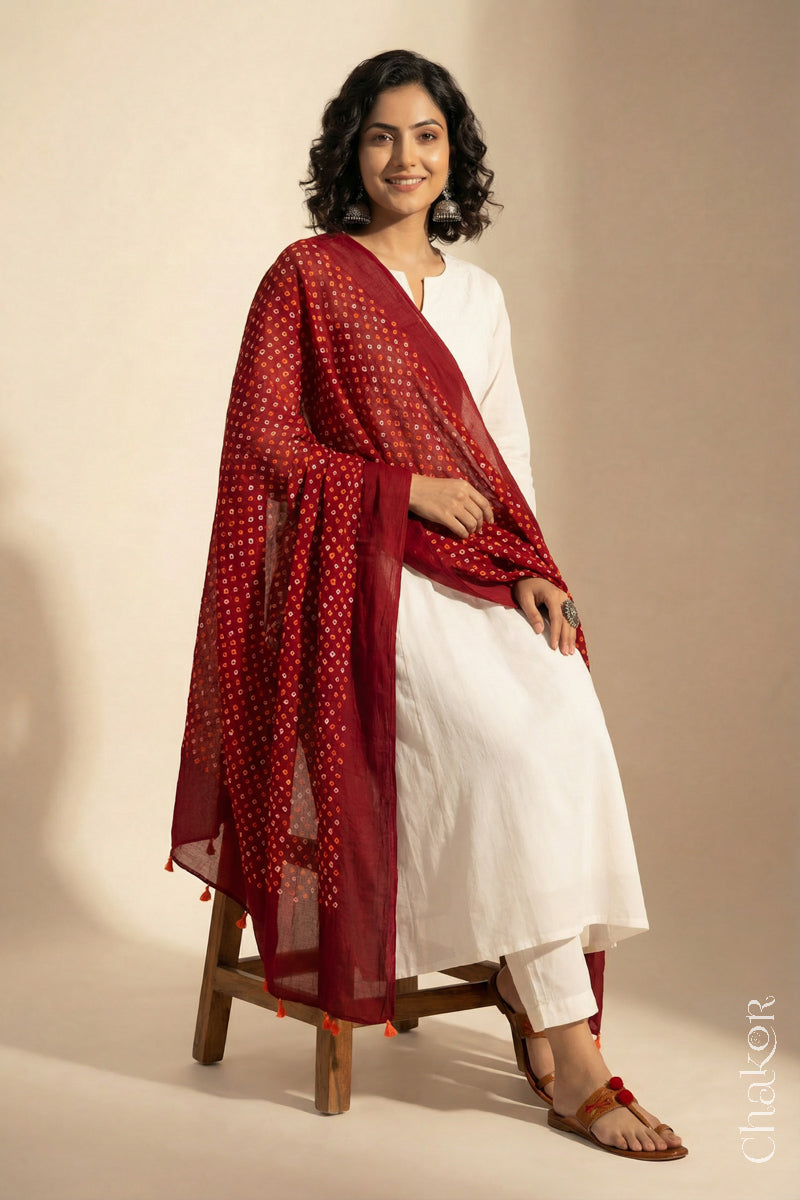 Red Mercerised Mulmul Bandhani Dupatta draped on model - Real Bandhej by CHAKOR