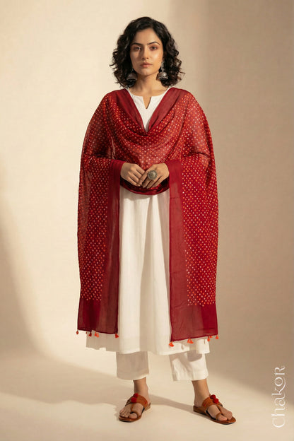 Red Mercerised Mulmul Bandhani Dupatta draped on model - Real Bandhej by CHAKOR