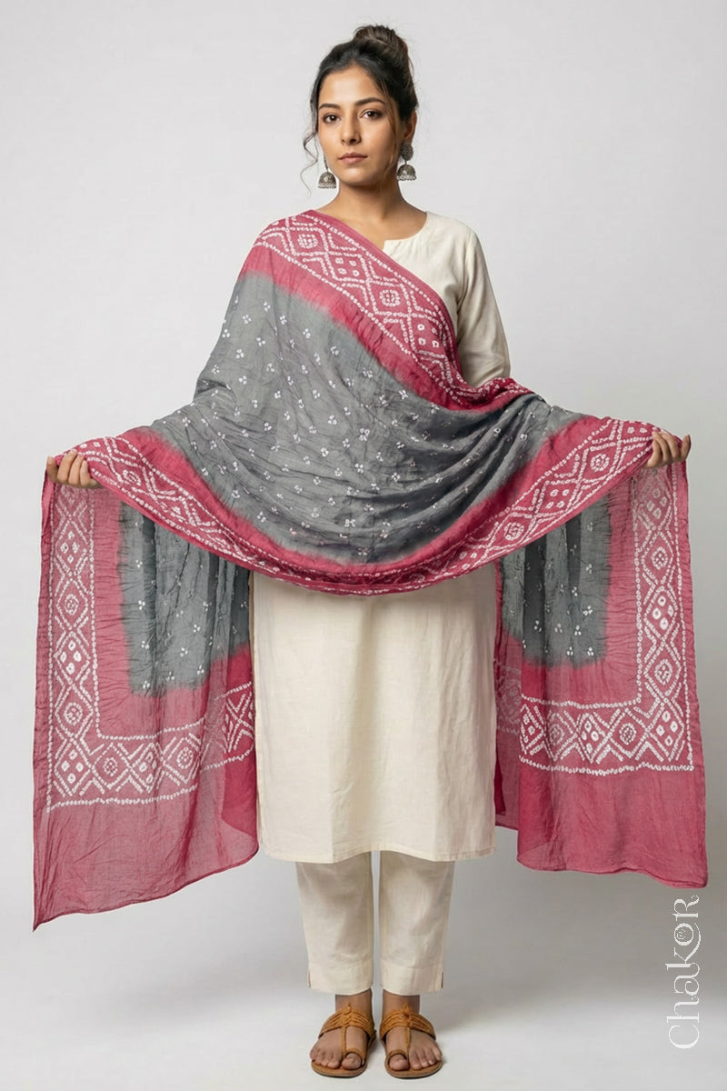 Model wearing Cement Grey & Rose Pink Bandhani Mul Cotton Dupatta in Traditional Design on white kurta set.