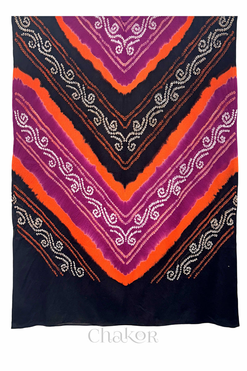 Flat view of magenta and black Bandhani mul cotton dupatta showing chevron-style tie-dye band pattern.