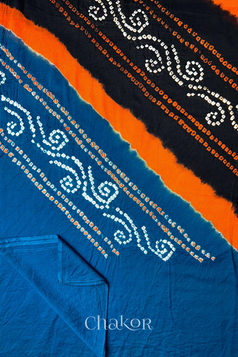 Detail view of indigo blue pallu of Bandhani mul cotton dupatta with black and contrasting dyed bands.