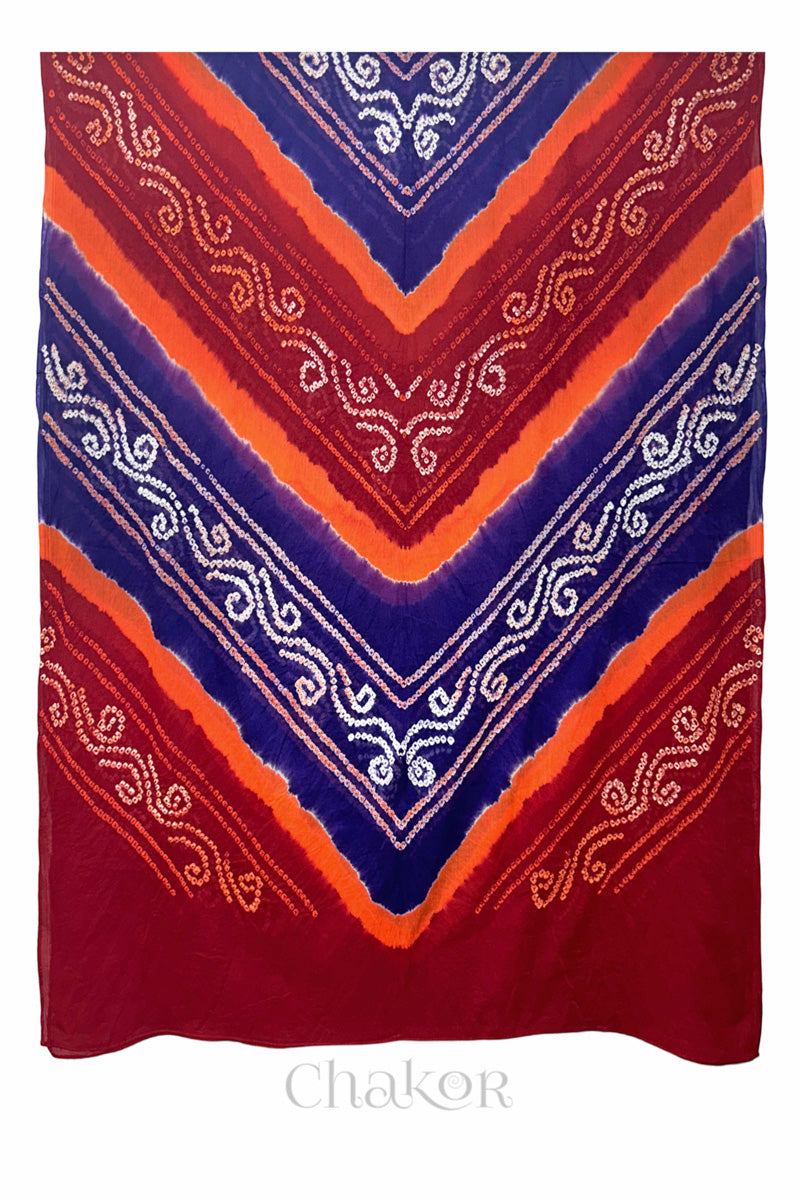Flat front view of red and purple Bandhani mul cotton dupatta showing chevron-style tie-dye band pattern.