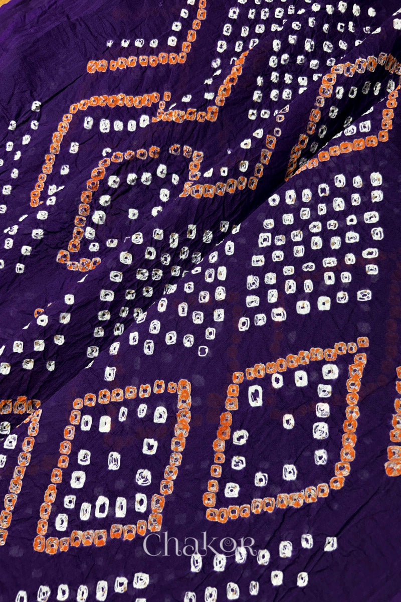Detailed texture view of Chorkat Bandhani motifs on Purple Mul Cotton Dupatta by Chakor.
