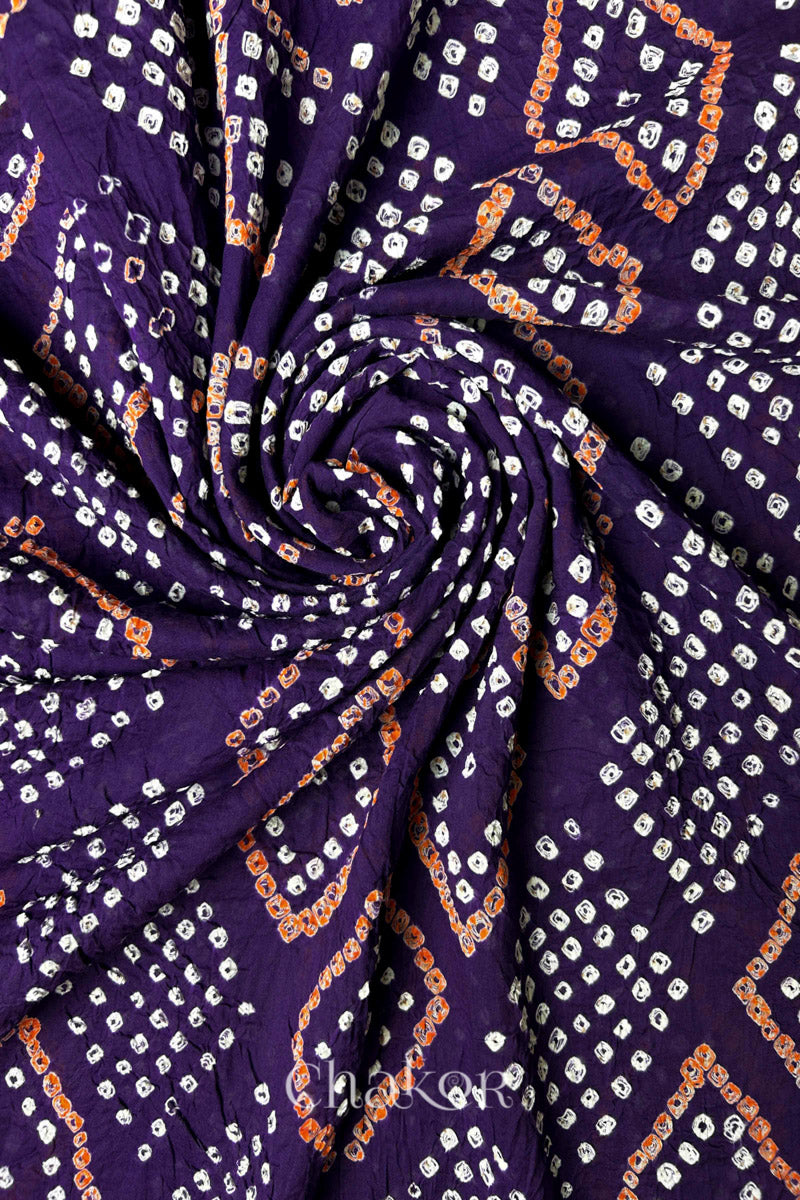 Swirl shot showing Bandhani dot clusters and diamond motifs on Purple Mul Cotton Dupatta by Chakor.