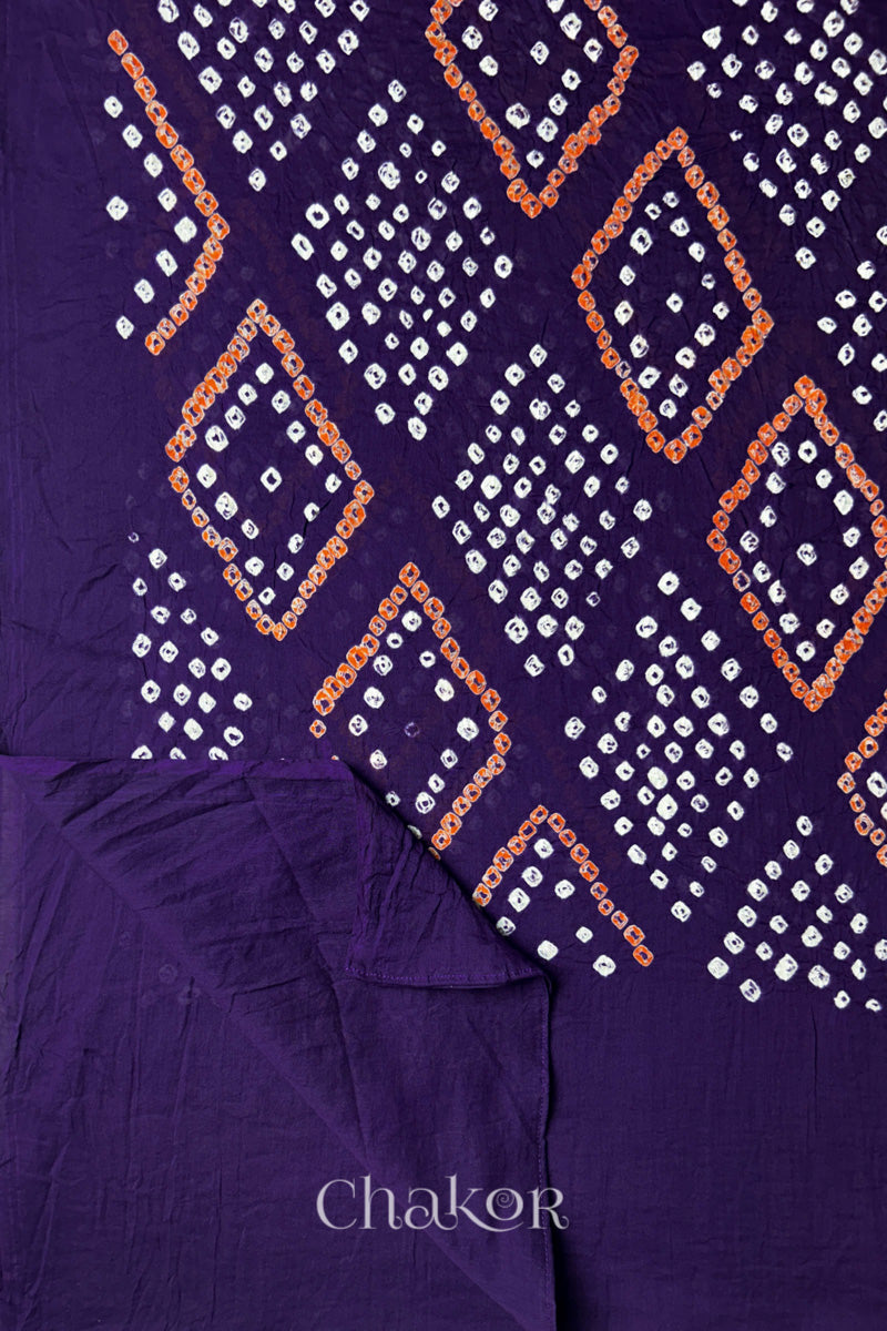 Flatlay of Purple Bandhani Mul Cotton Dupatta with Chorkat diamond layout and border view  by Chakor.