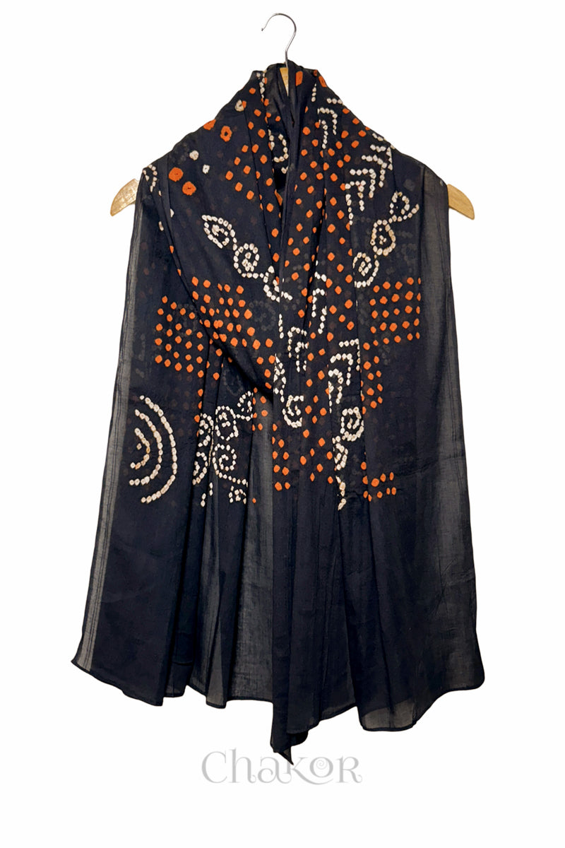 Black Bandhani Mul Cotton Dupatta in Traditional Design for Women draped beautifully on a wooden hanger