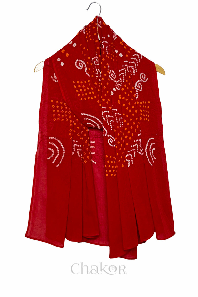 Red Bandhani Mul Cotton Dupatta in Traditional Design for Women draped beautifully on a wooden hanger