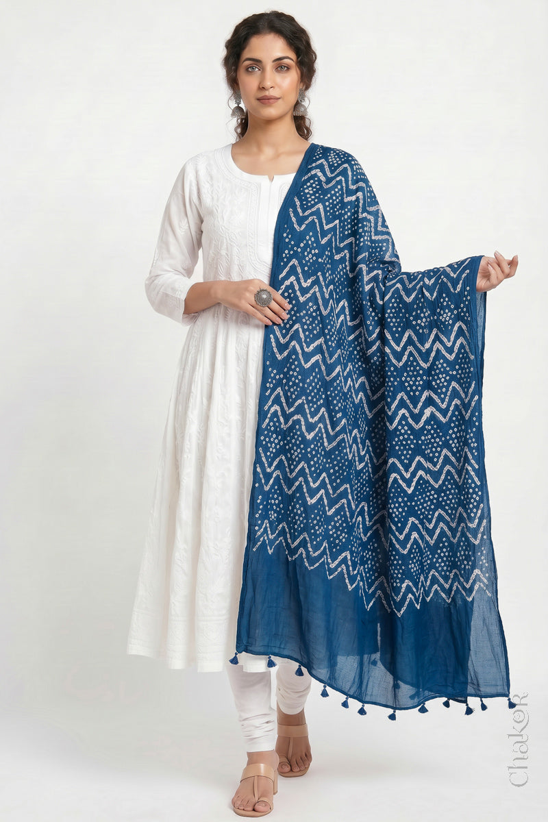 Indigo Blue Kutch Bandhani dupatta in lightweight mercerised mulmul cotton with flowing drape.
