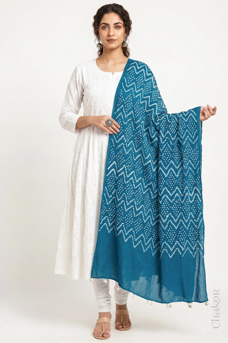 Turquoise Blue Kutch Bandhani dupatta in lightweight mercerised mulmul cotton with flowing drape.