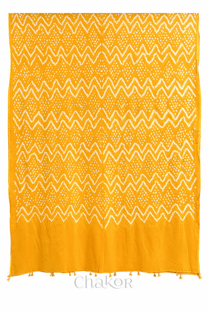 Full view of Yellow Kutch Bandhani dupatta in pure mercerised mulmul cotton.
