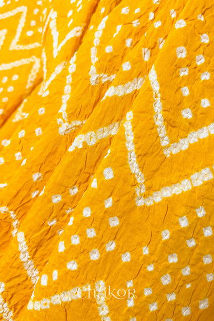 Soft mercerised mulmul cotton texture with authentic Bandhani tie dye work.
