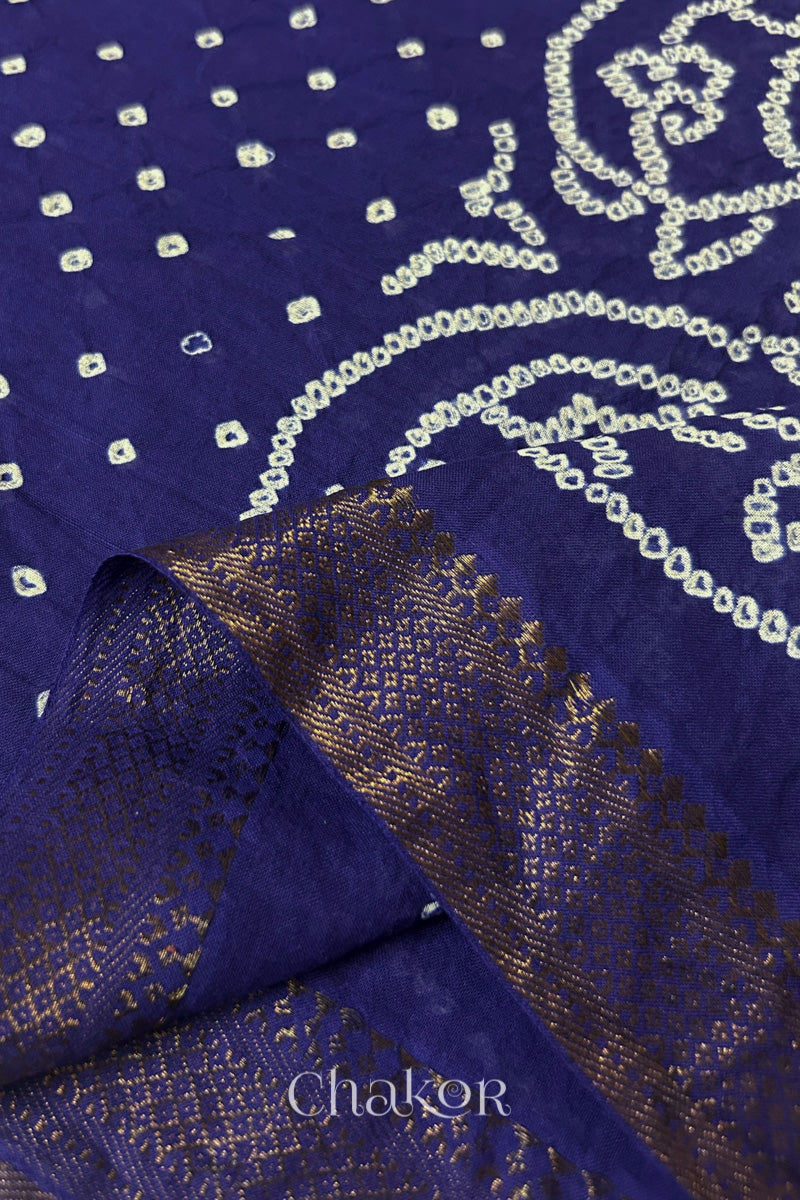 Close-up of the golden zari border on Navy blue handloom Mangalgiri cotton Bandhani dupatta.
