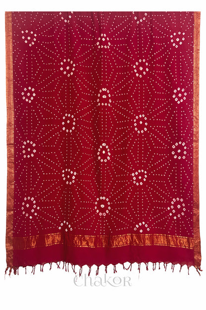 Red Bandhani Mangalgiri cotton dupatta shown in full, with white dotted pattern and zari border.
