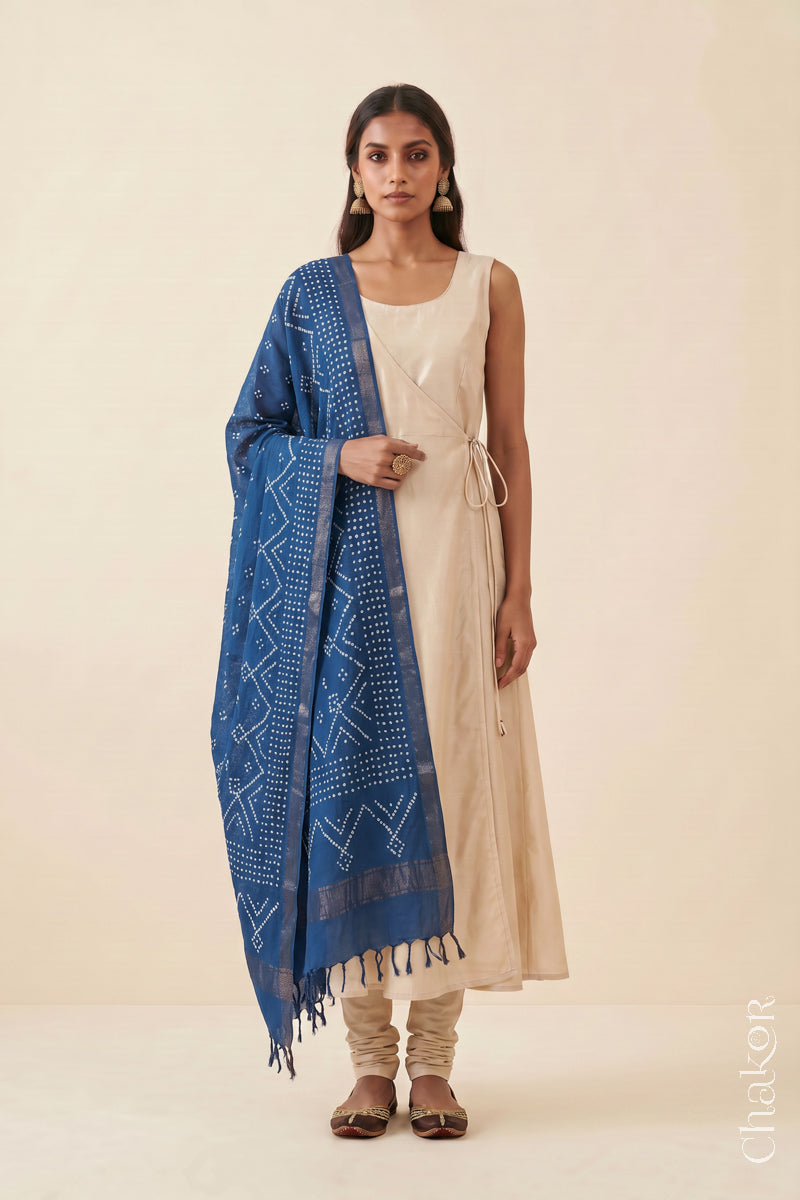 Indigo Blue Bandhani handloom Mangalgiri cotton dupatta showing its white dotted pattern and zari border.
