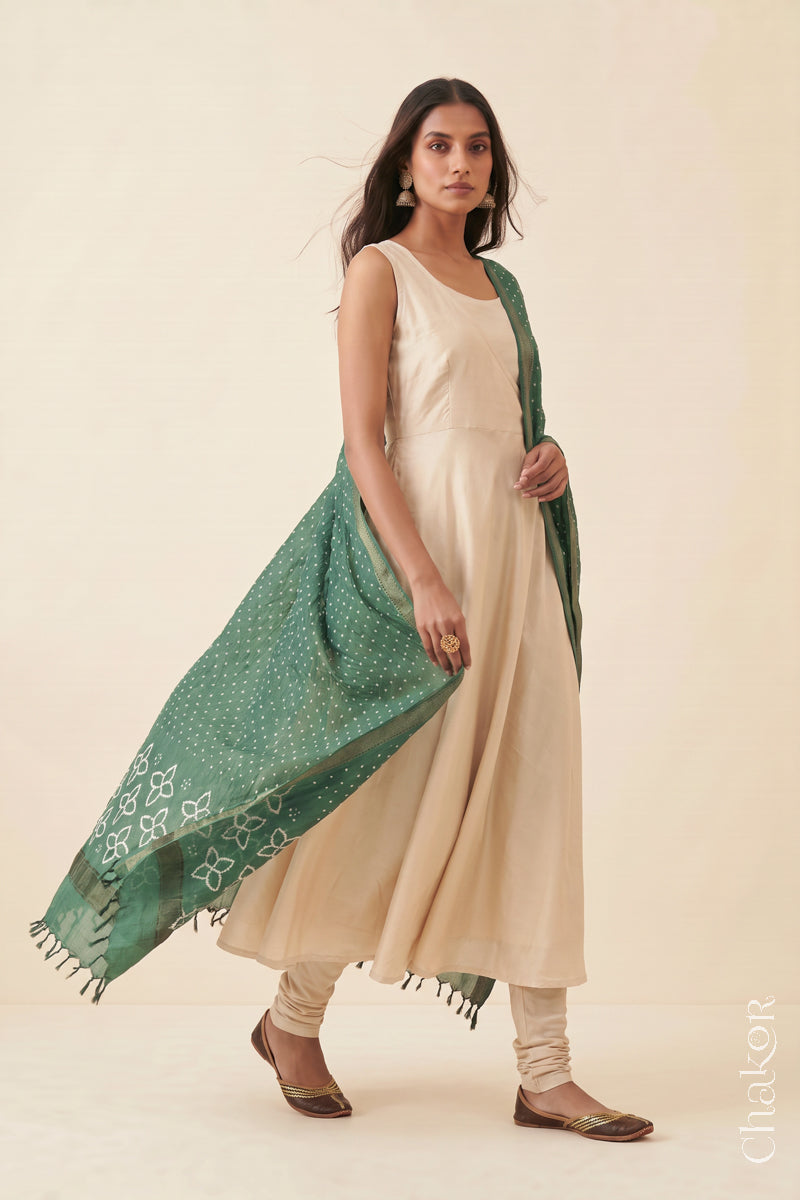 Moss Green Bandhani handloom Mangalgiri cotton dupatta worn by a woman, shown in motion.
