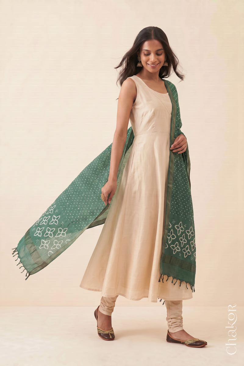 Moss Green Bandhani handloom Mangalgiri cotton dupatta worn by a woman, shown in motion.
