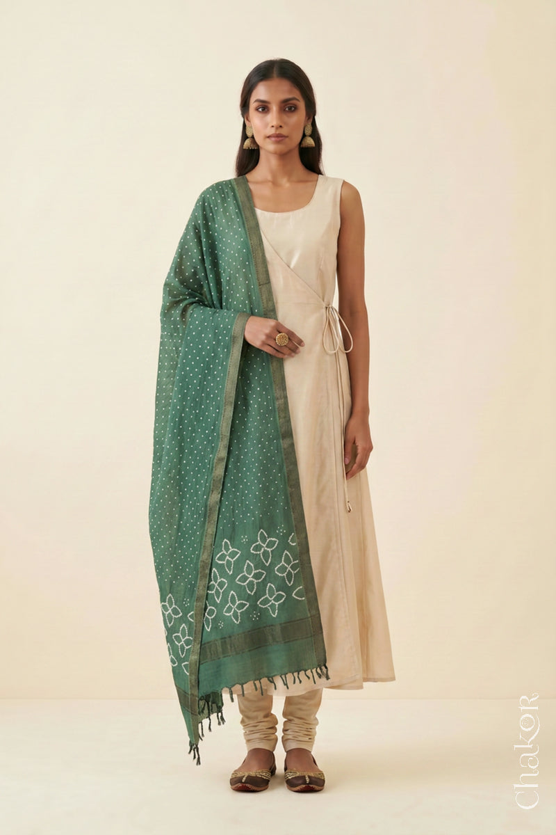 Moss Green Bandhani Mangalgiri cotton dupatta worn by a woman, showing the zari border and pallu.
