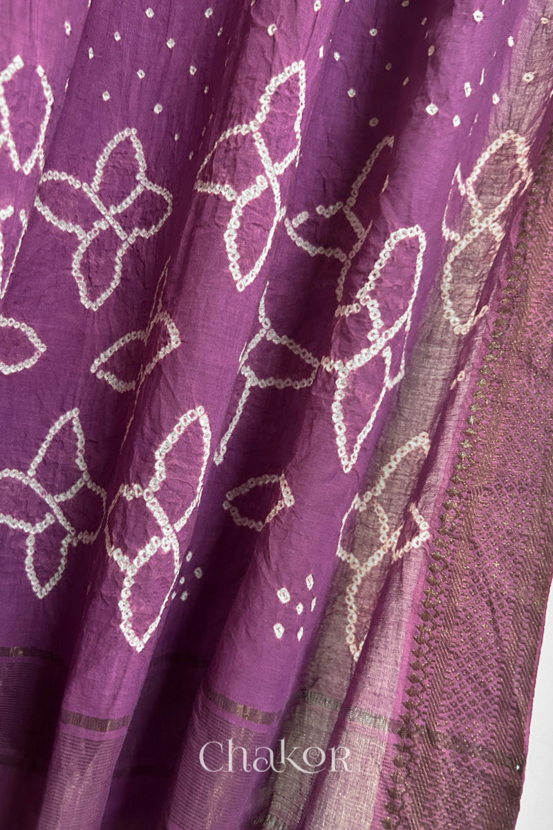 Close-up of Mauve Mangalgiri cotton fabric showing its handloom weave and opacity.
