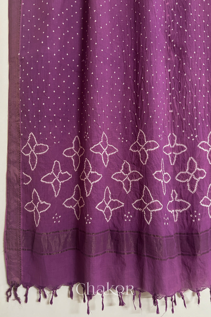 Mauve Bandhani Mangalgiri cotton dupatta, showing the draped of patterned pallu, golden zari detailing and tassels.
