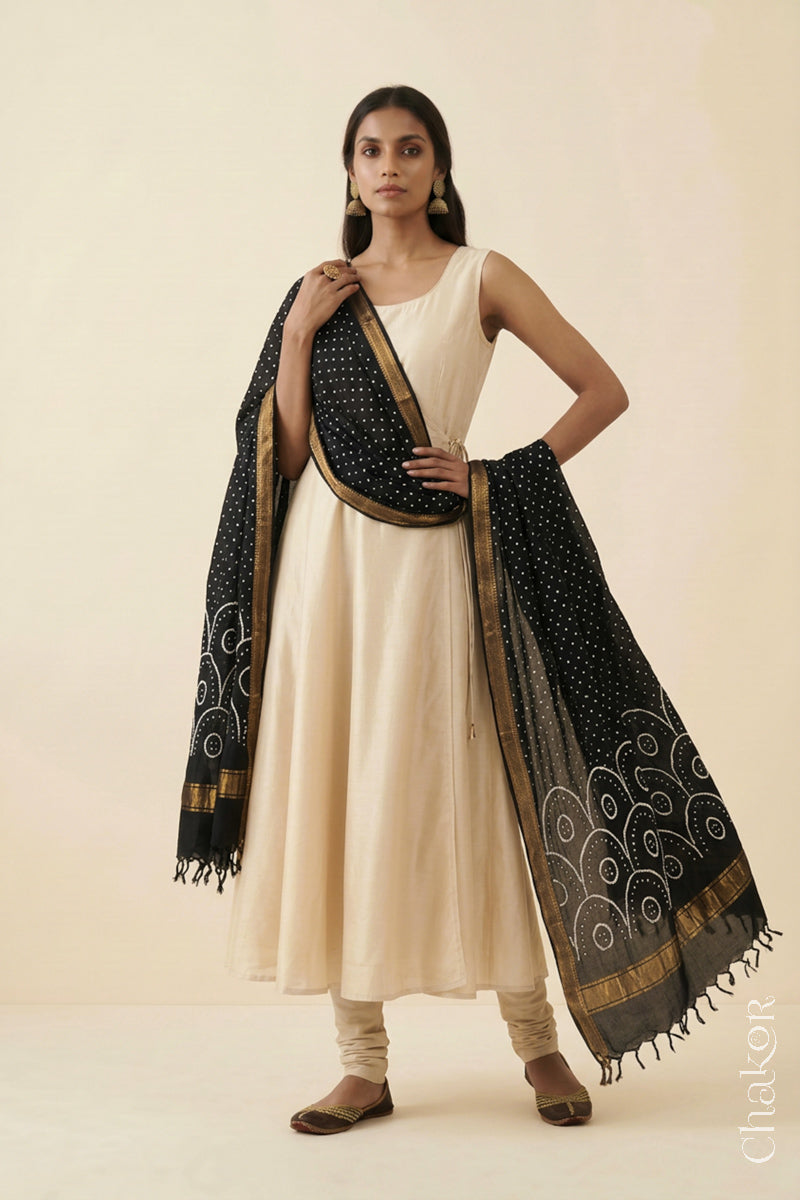 Black Bandhani handloom Mangalgiri cotton dupatta worn by a woman, shown in motion.
