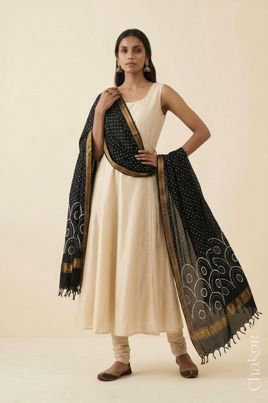 Black Bandhani handloom Mangalgiri cotton dupatta worn by a woman, shown in motion.
