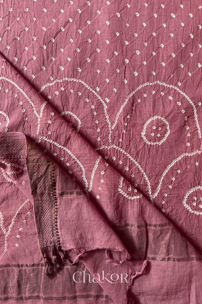 Old Rose Pink Bandhani Mangalgiri cotton dupatta flat view, showing the patterned pallu and golden zari detailing.
