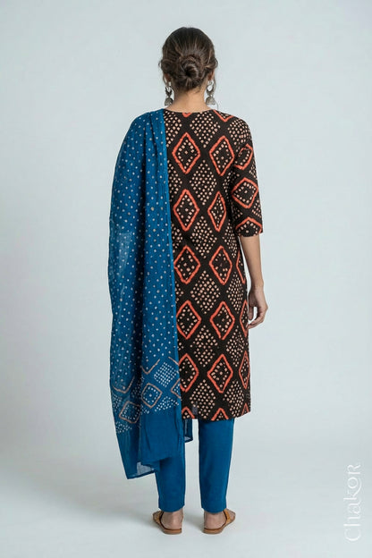 Model wearing Handcrafted Blue Bandhani Cotton Kurta and Indigo Blue Pant Set with Dupatta with traditional design and hand embroidery.