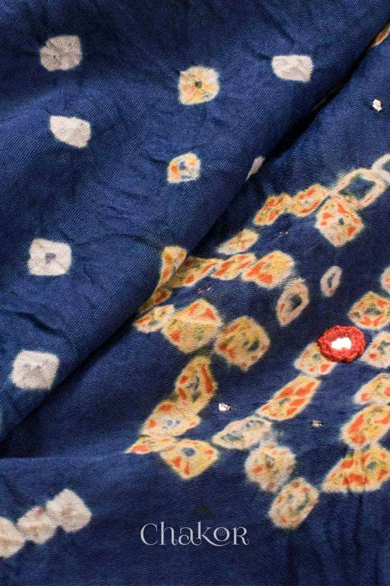 Close up of Indigo Blue Bandhani Cotton Tunic with Rust Pant with Dupatta, Handcrafted in Kutch with traditional tie-dye design and hand embroidery.