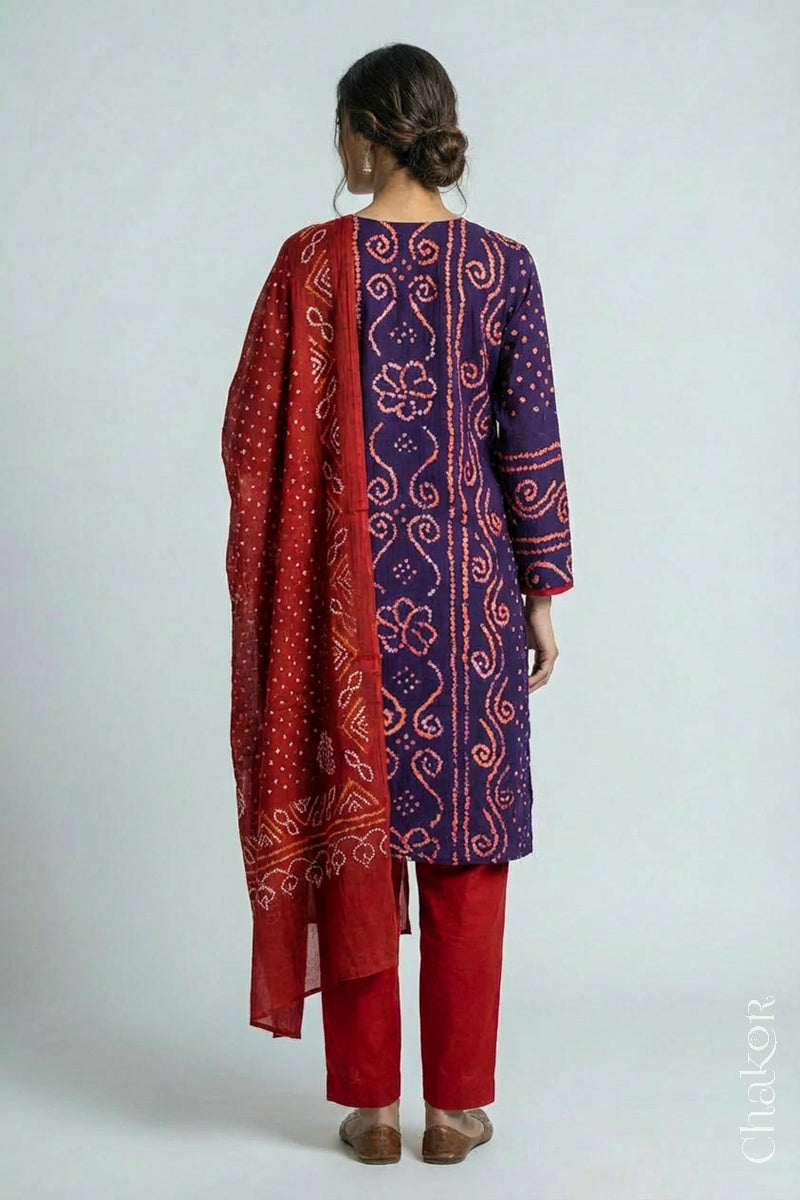 Model wearing Purple Bandhani Cotton Tunic with Red Pant with Dupatta, Handcrafted in Kutch with traditional design and hand embroidery.