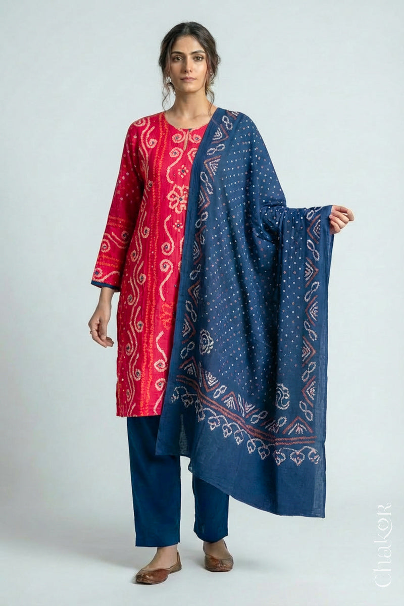 Model wearing Pink Bandhani Cotton Tunic and Indigo Blue Pant with Dupatta, Handcrafted in Kutch with traditional design and hand embroidery.