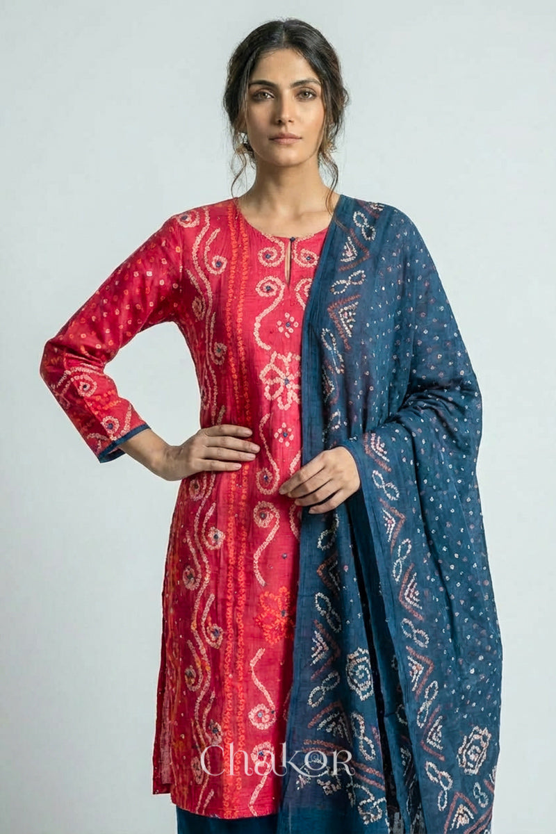 Model wearing Pink Bandhani Cotton Tunic and Indigo Blue Pant with Dupatta, Handcrafted in Kutch with traditional design and hand embroidery.