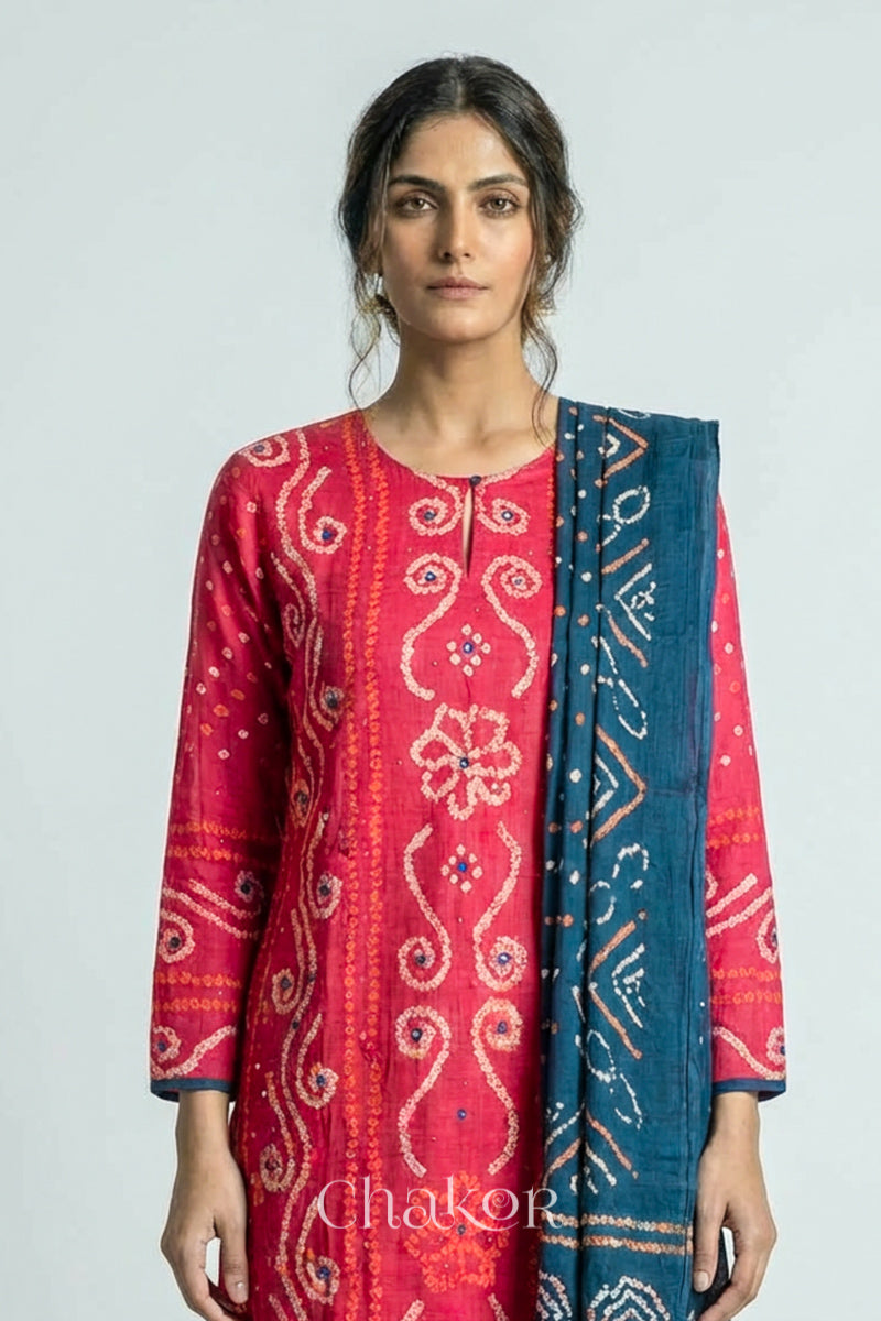 Model wearing Pink Bandhani Cotton Tunic and Indigo Blue Pant with Dupatta, Handcrafted in Kutch with traditional design and hand embroidery.