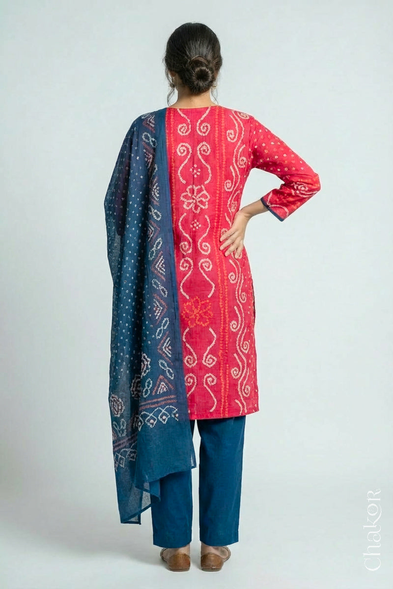 Model wearing Pink Bandhani Cotton Tunic and Indigo Blue Pant with Dupatta, Handcrafted in Kutch with traditional design and hand embroidery.