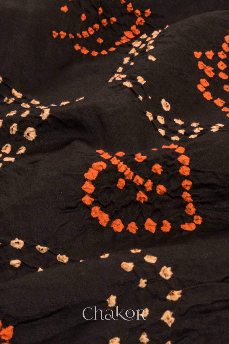 Close up of handcrafted Black Indigo Kurta Set and a matching dupatta.