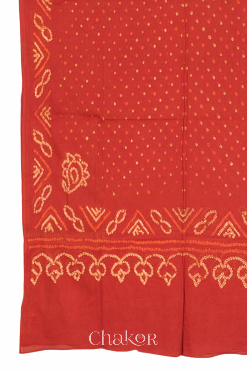 Dupatta detail from handcrafted Indigo blue and rust Kurta Set and a matching dupatta with traditional bandhani tie-dye patterns.