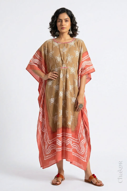 Mulmul cotton bandhani kaftan dress for women with mirror work in beige and rust, relaxed fit for summer.
