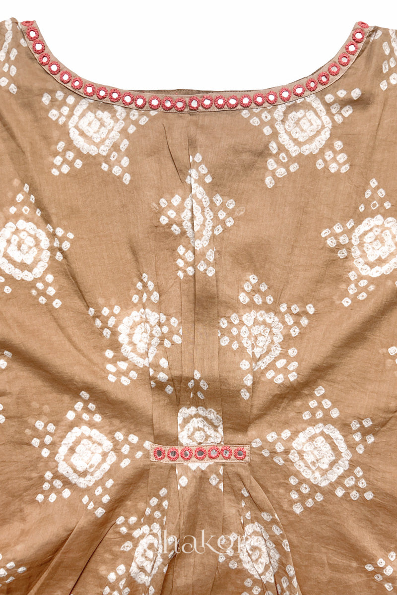 Kutch Bandhani pattern with mirror neckline detail on handcrafted cotton mulmul kaftan dress.
