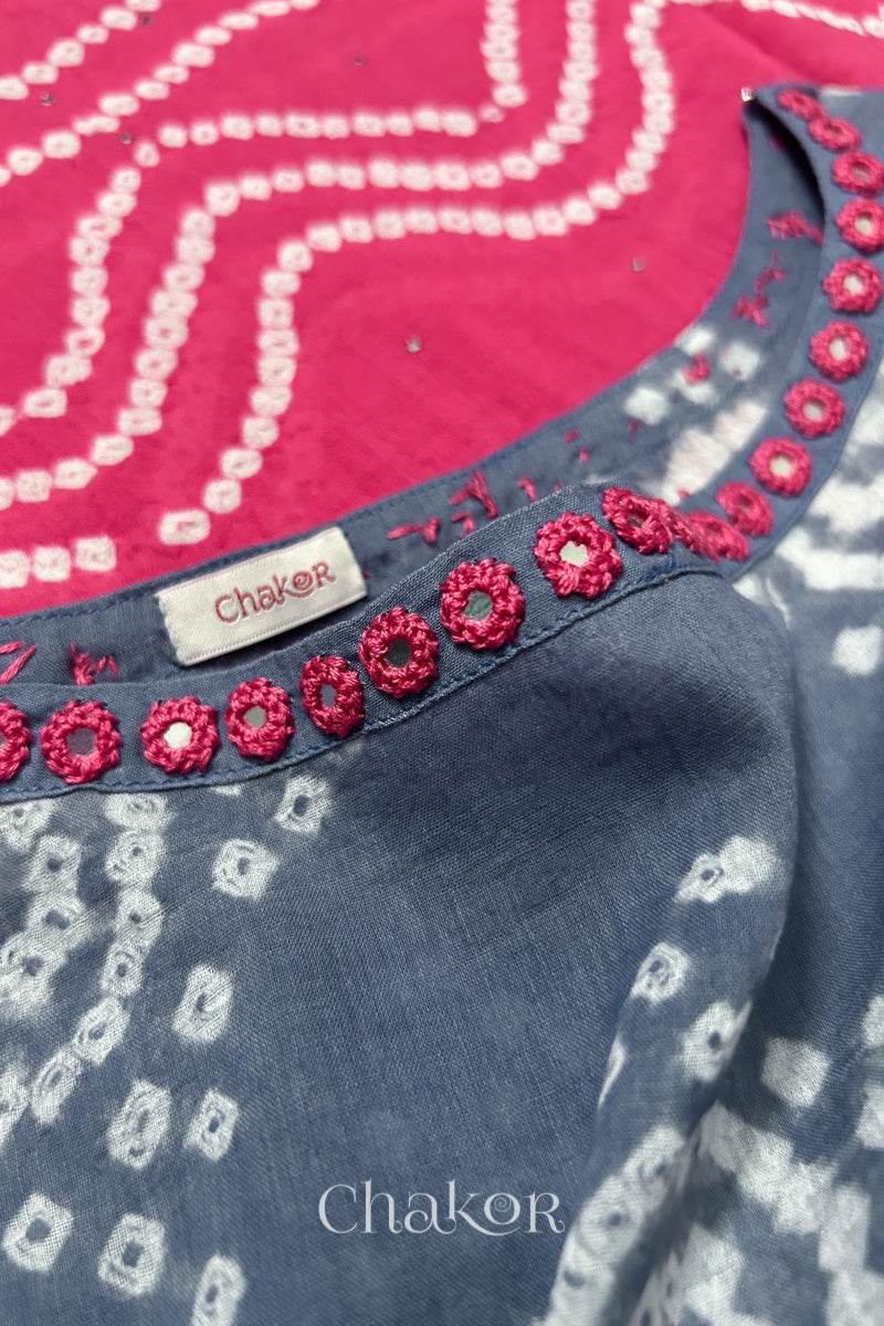 Mirror work neckline detail on mulmul cotton bandhani kaftan in bluish grey and pink, handcrafted in Kutch.
