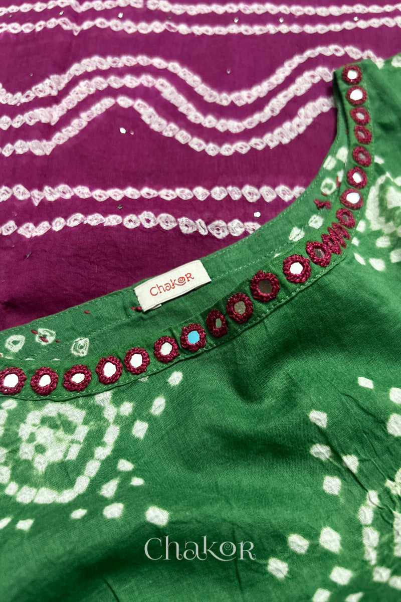 Mirror work neckline detail on mulmul cotton bandhani kaftan in green and magenta, handcrafted in Kutch.
