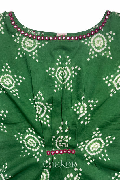 Kutch Bandhani pattern with mirror neckline detail on handcrafted cotton mulmul kaftan dress.
