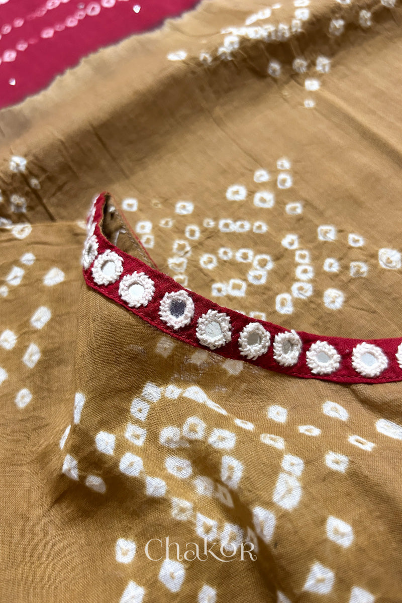 Kutch Bandhani pattern with mirror neckline detail on handcrafted cotton mulmul kaftan dress.
